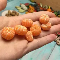 Мандарин из полимерной глины и дольки